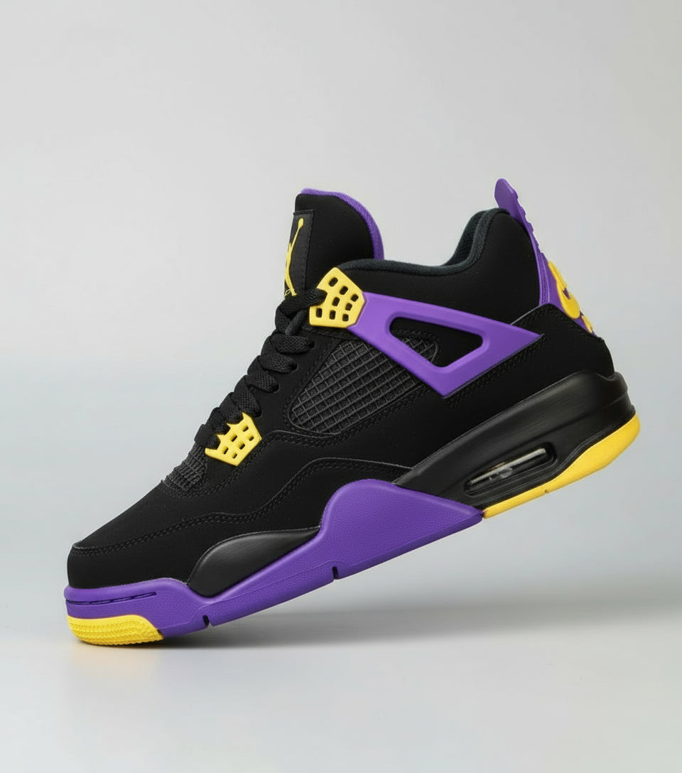 Black and purple sneaker with yellow accents on a white background