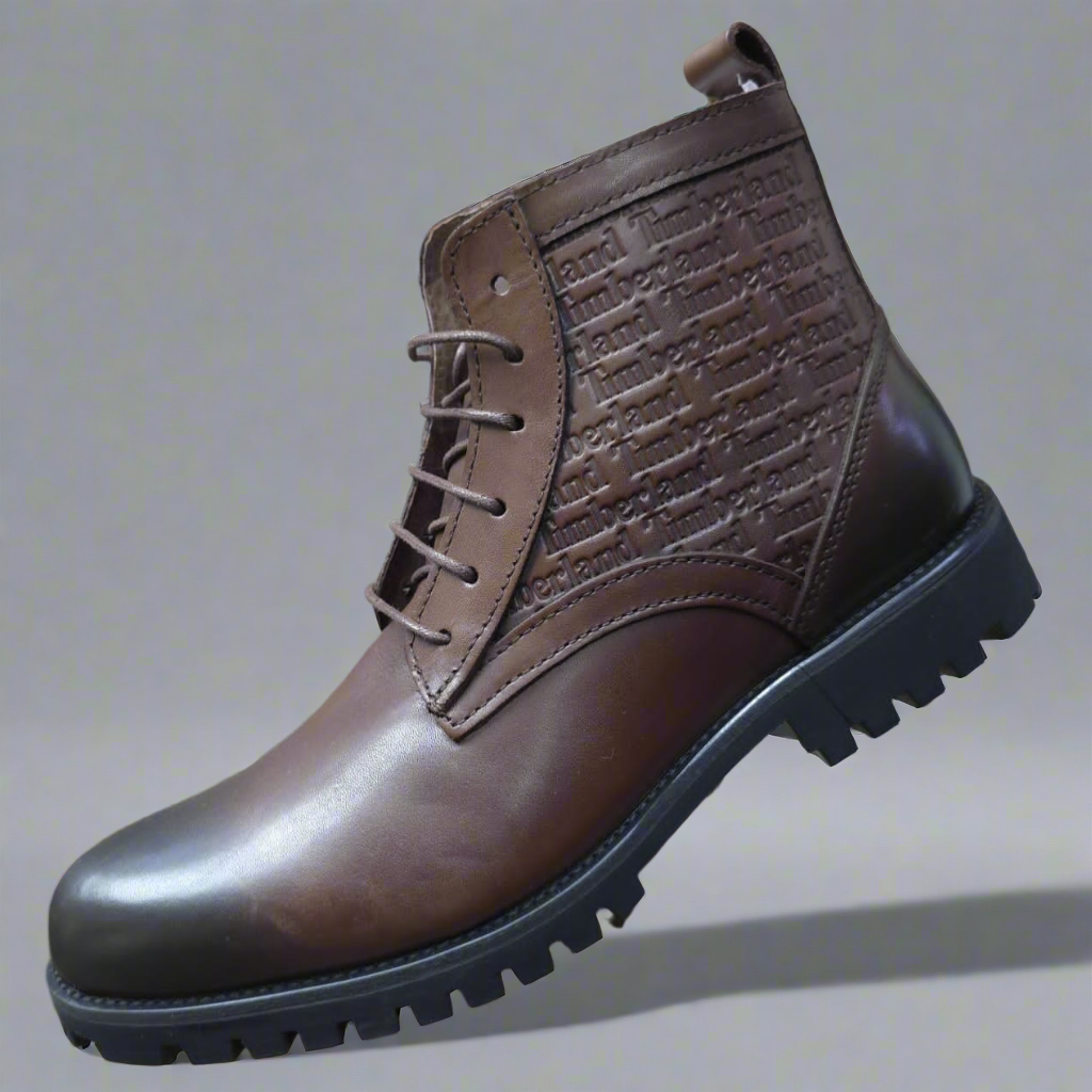Timberland Men Leather Boots – Rugged Ankle Design.