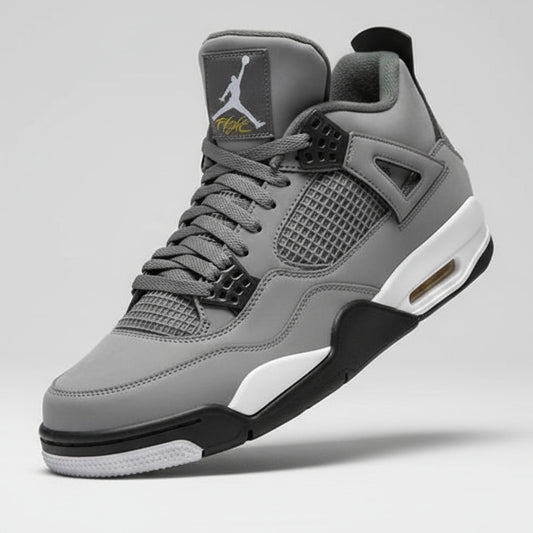 Gray sneaker with black accents worn by a person, blurred background