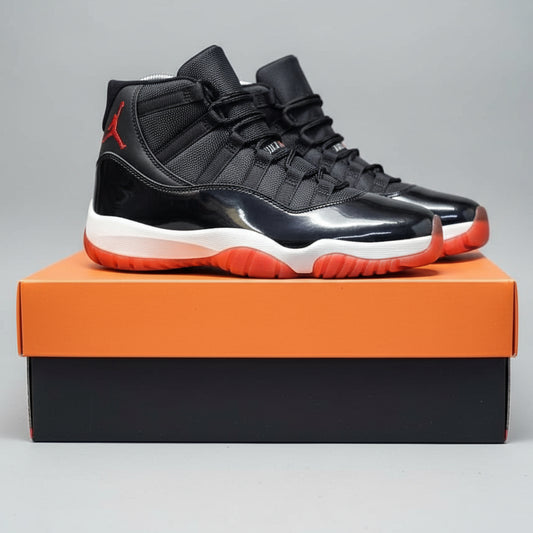 Black and red high-top sneakers on a Nike box with a blurred background